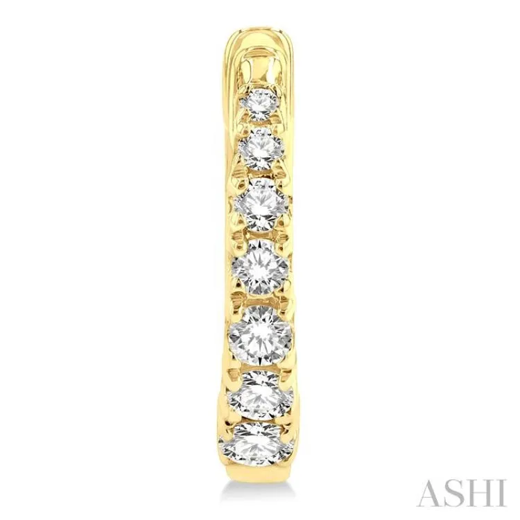 1/4 ctw Petite Graduated Round Cut Diamond Fashion Huggies in 10K Yellow Gold