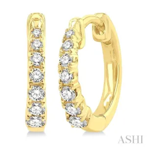 1/4 ctw Petite Graduated Round Cut Diamond Fashion Huggies in 10K Yellow Gold