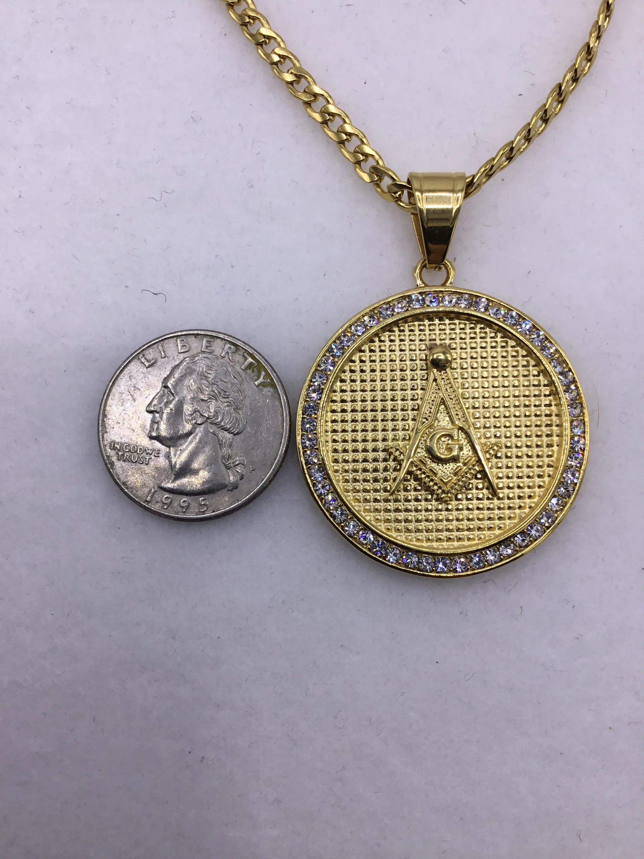 18k gold over stainless steel Medallion with Cubic Zirconia includes Cuban link chain set