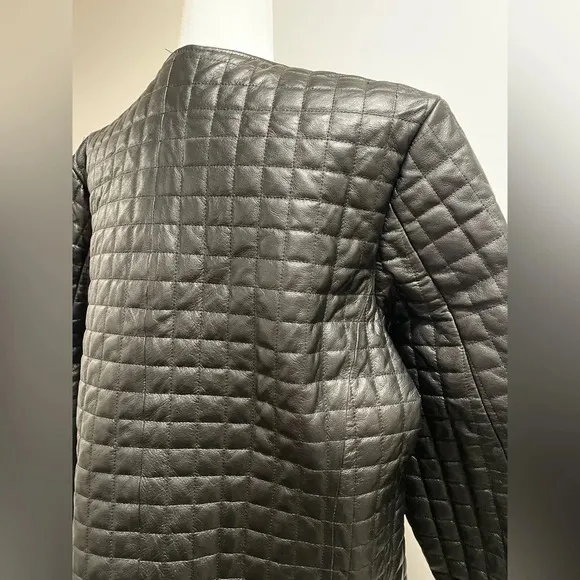NWOT Pamela McCoy black quilted leather jacket. Size 2x.